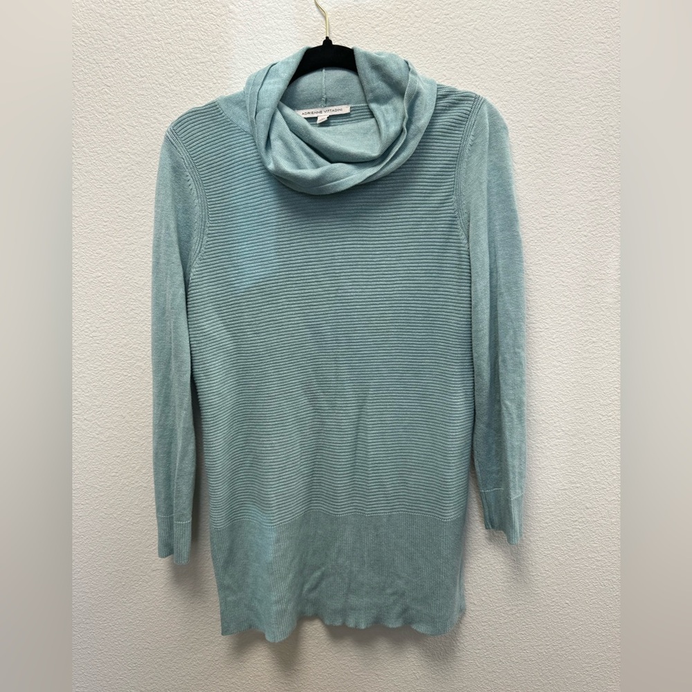 Gently used long turtleneck sweater. Blue/green in color.